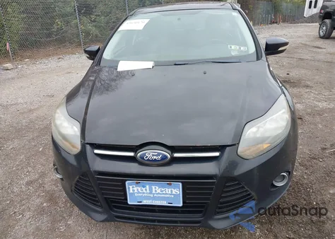 2013 Ford Focus Titanium z USA, uszkodzony, nr VIN 1FADP3N21DL348795